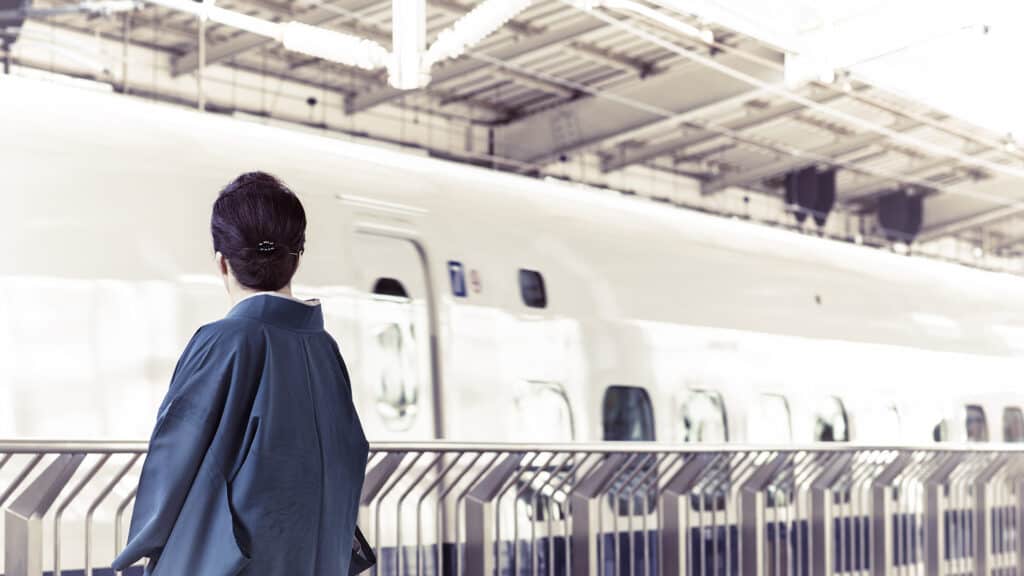 7 Unspoken rules of things NOT to do on the Tokyo subway man waiting for train