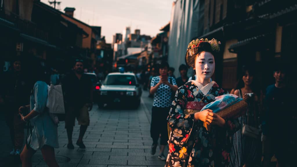 Geisha and maiko walking in Kyoto