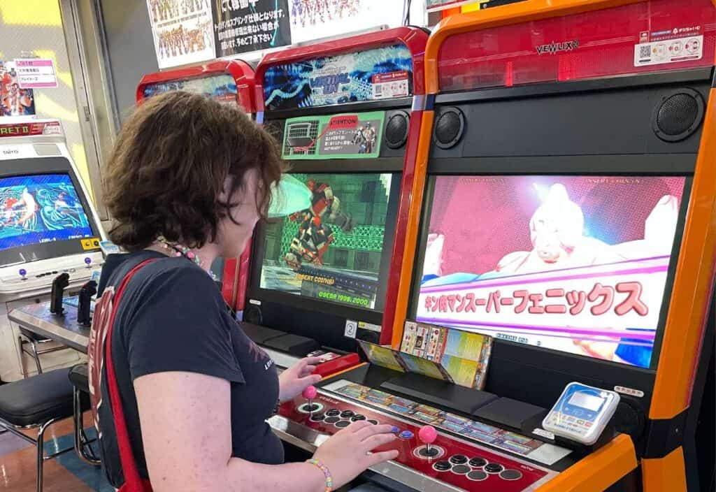 Tokyo-Akihabara-girl playing kinnikuman-landscape-1 (Exploring Akihabara: Living the Ultimate Otaku Dream)