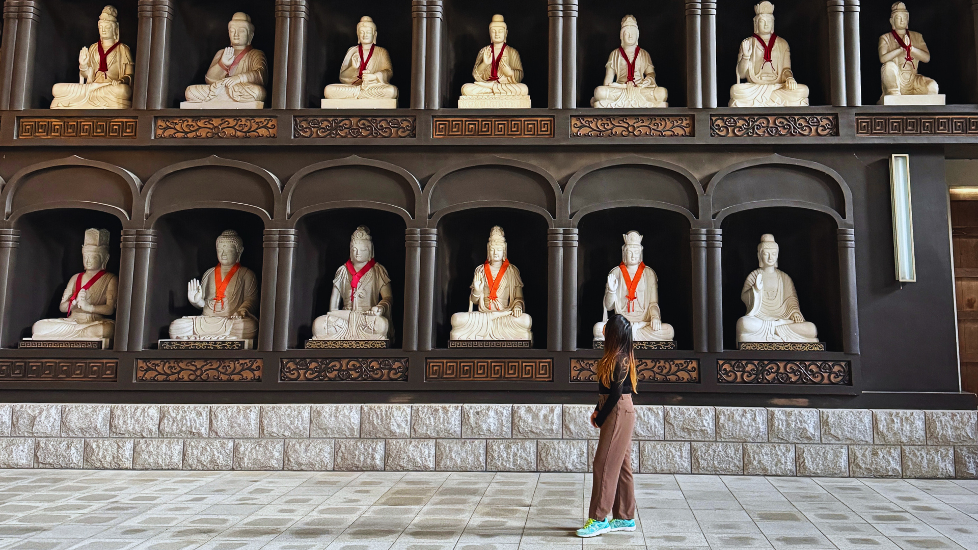 Flip Japan photo of a woman at Echizen Daibutsu on a Japan solo trip