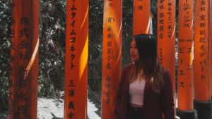 Flip Japan photo of a woman on a Japan solo trip at Fushimi Inari