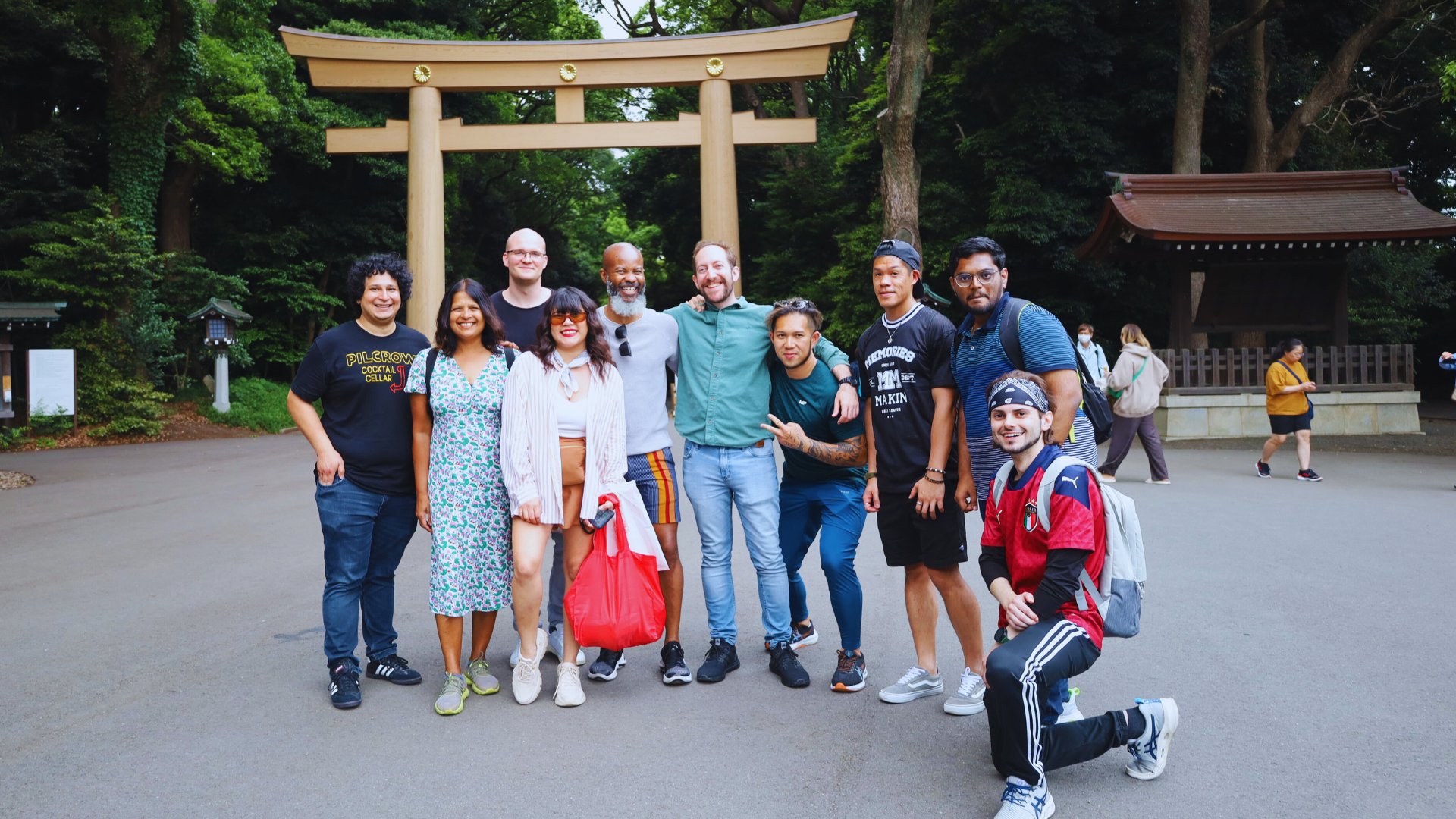 Flip Japan photo of a Japan family holiday posing at a tori gate at Meiji Jingu