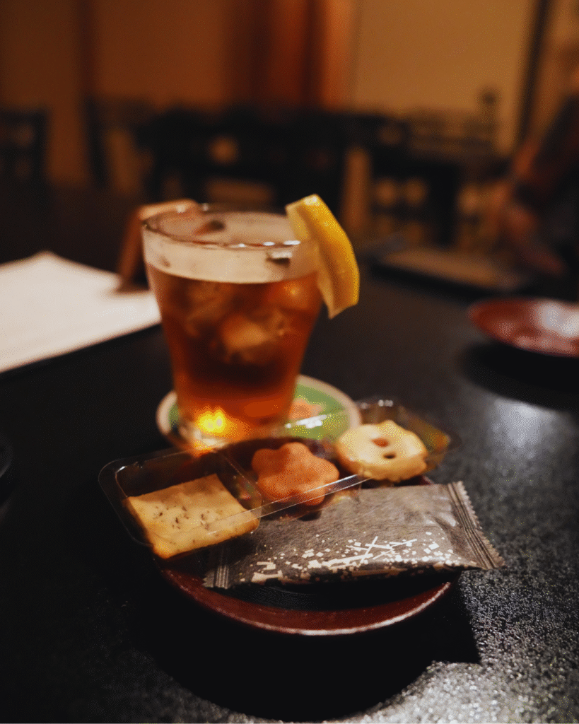 Flip Japan photo of a cocktail and snacks in foodie Japan