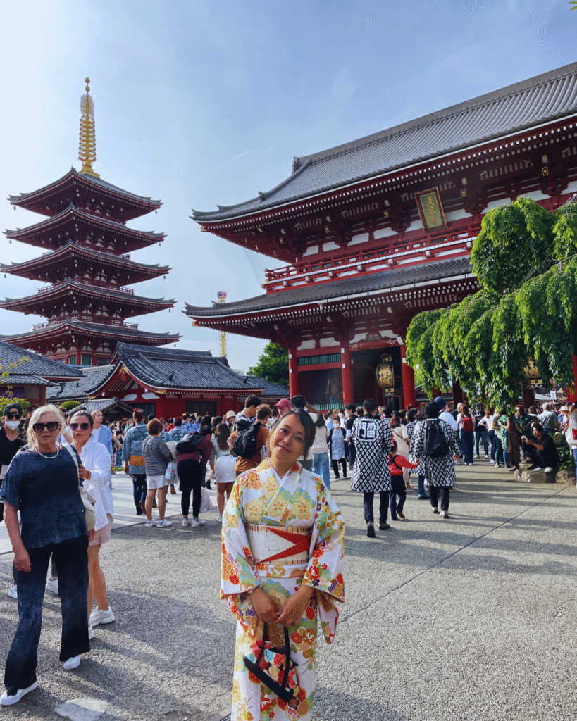 Flip Japan photo of a woman in kimono at Senso-ji temple for Osaka vs Tokyo