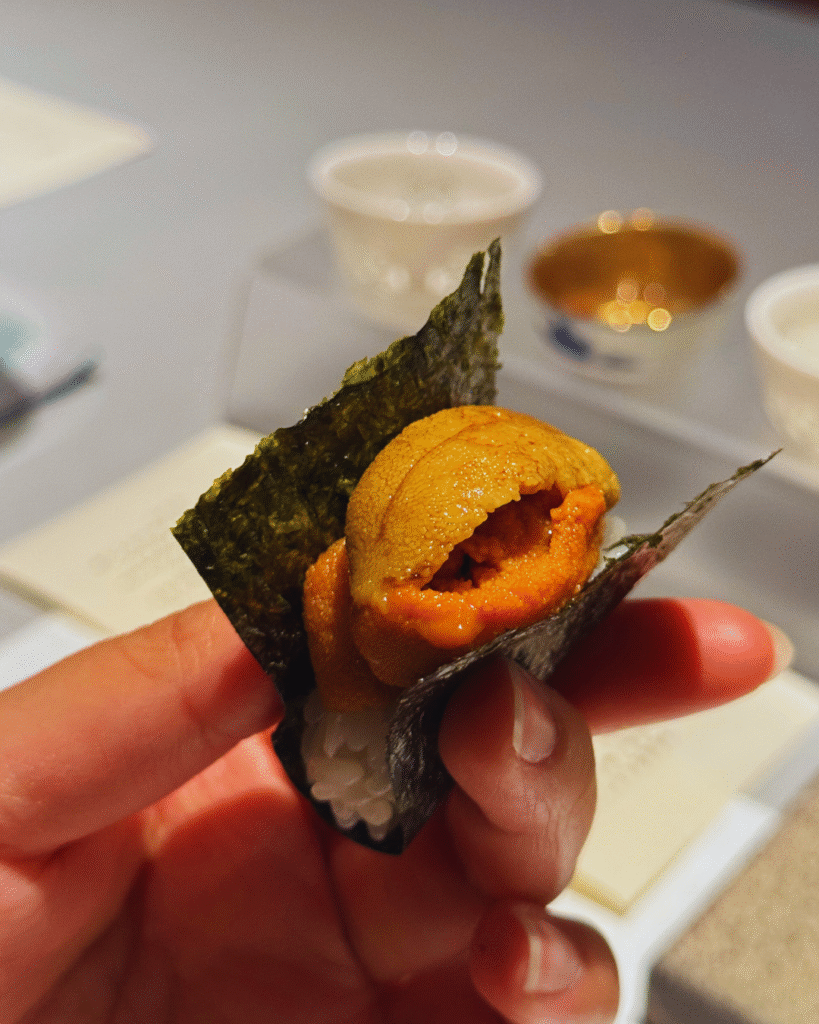 Flip Japan photo of an uni handroll in foodie Japan