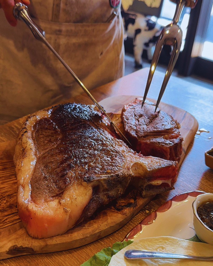 Flip Japan photo of a man slicing into a kobe beef stake in foodie Japan