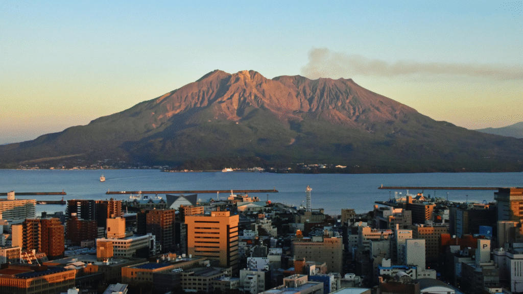 Photo of Sakurajima over Kagoshima, one of the best small cities in Japan
