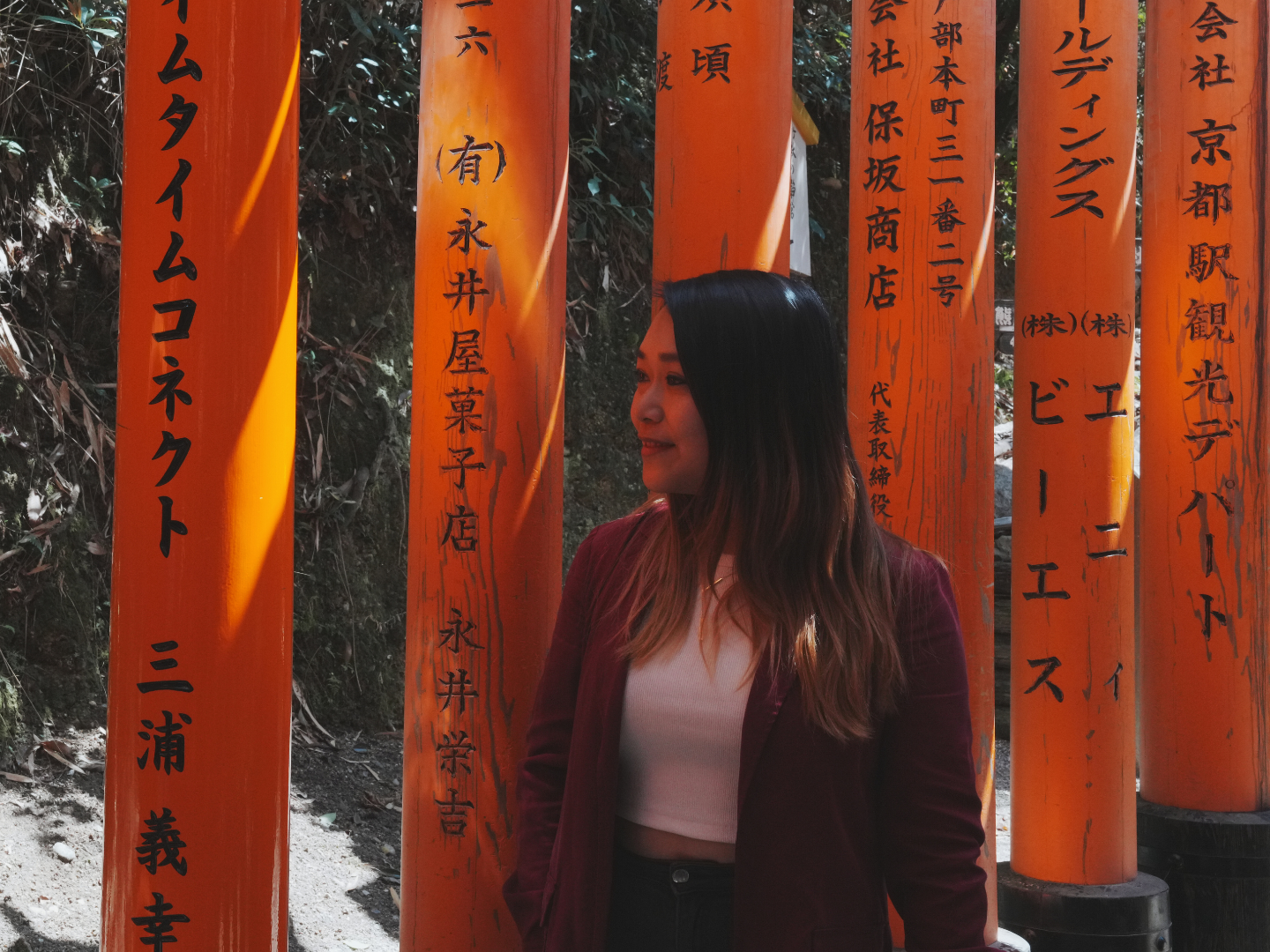 Flip Japan photo of a woman on a Japan solo trip at Fushimi Inari