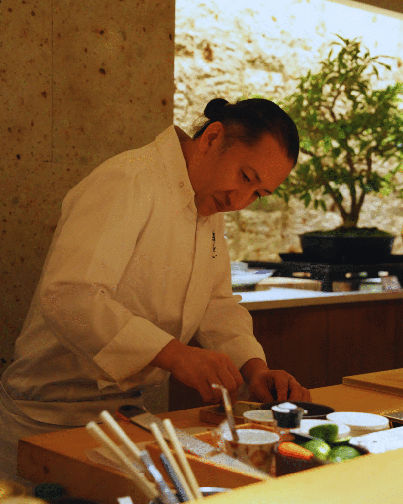 Flip Japan photo of a chef in Ginza preparing food for a Tokyo food guide