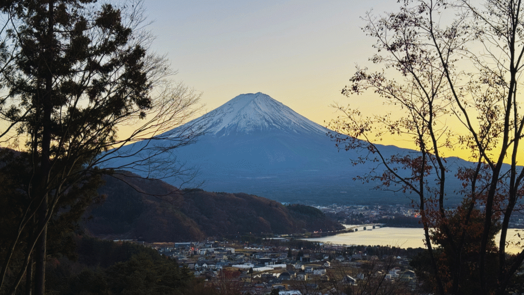 Flip Japan photo of Mount Fuji with its snow cap overlooking Lake Kawaguchiko