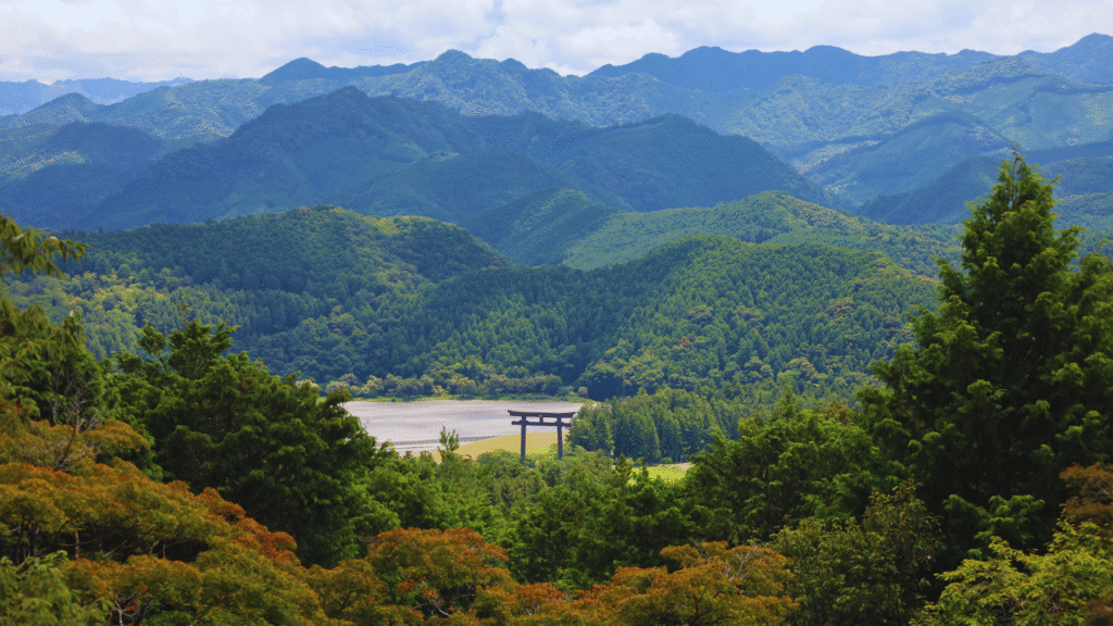 Flip Japan photo of the scenic view from the Kumano Kudo walk with mountains and a lake