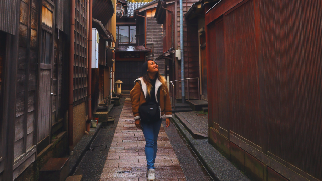 Flip Japan photo of Venese walking down the street in Higashi Chaya District