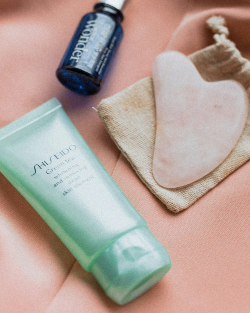 Photo of a selection of luxury japanese skincare including Shiseido and a quartz face massager