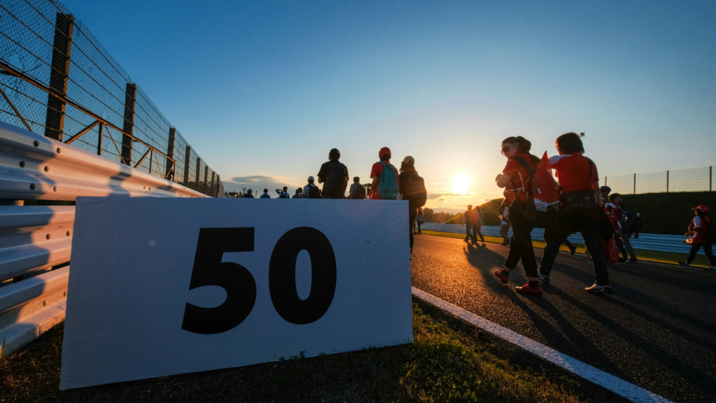 Photo of a group walking on Suzuka racetrack in Japan