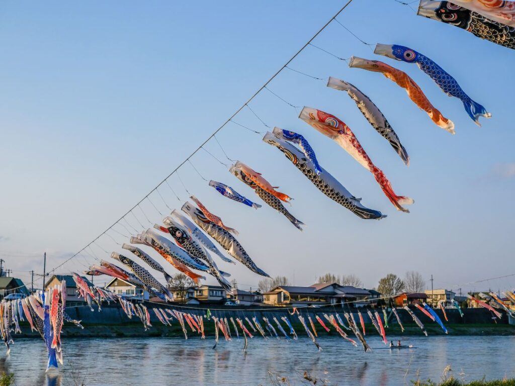 Colorful koinobori carp streamers flying over the Sagami River in Kanagawa, a famous sight during Golden Week in Japan