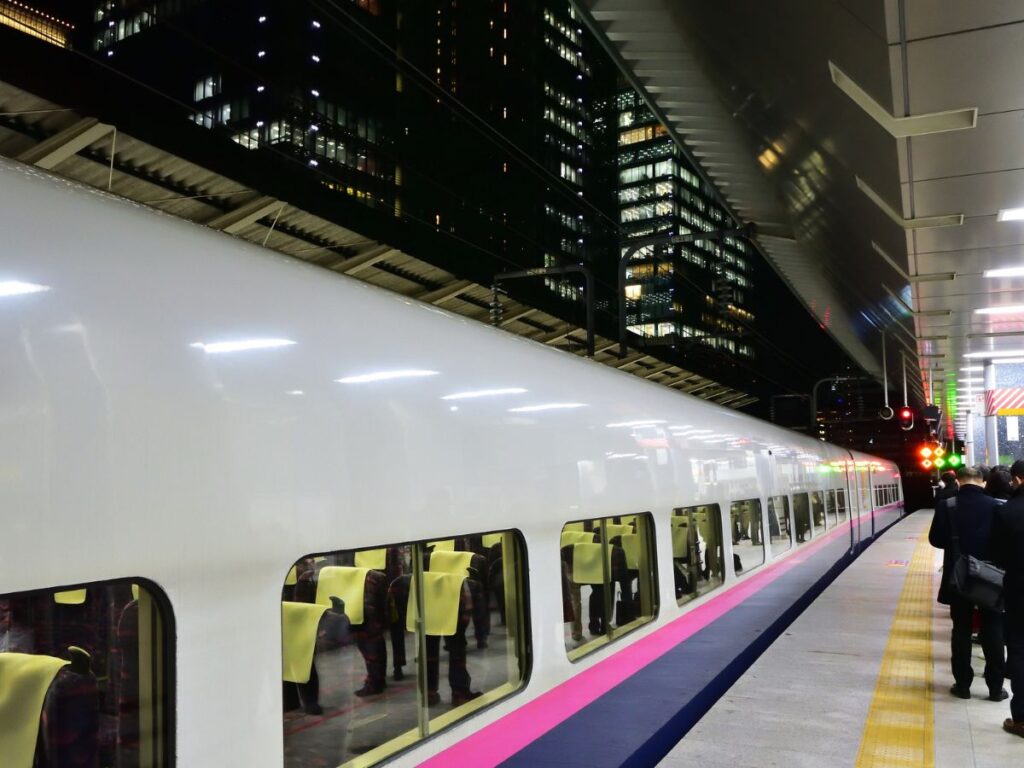 Crowded Shinkansen bullet train platform at Tokyo Station during the peak travel rush of Golden Week in Japan