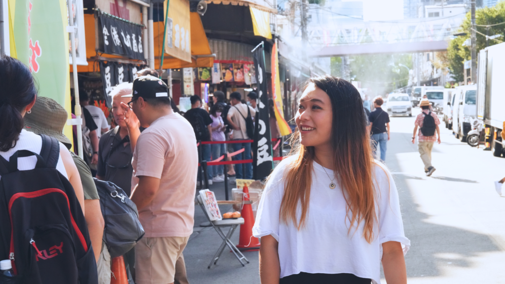 Flip Japan photo of a woman exploring tsukiji market