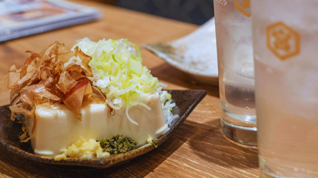 Photo of Japanese-style tofu with bonito flakes on top to show food that is not vegan in Kyoto