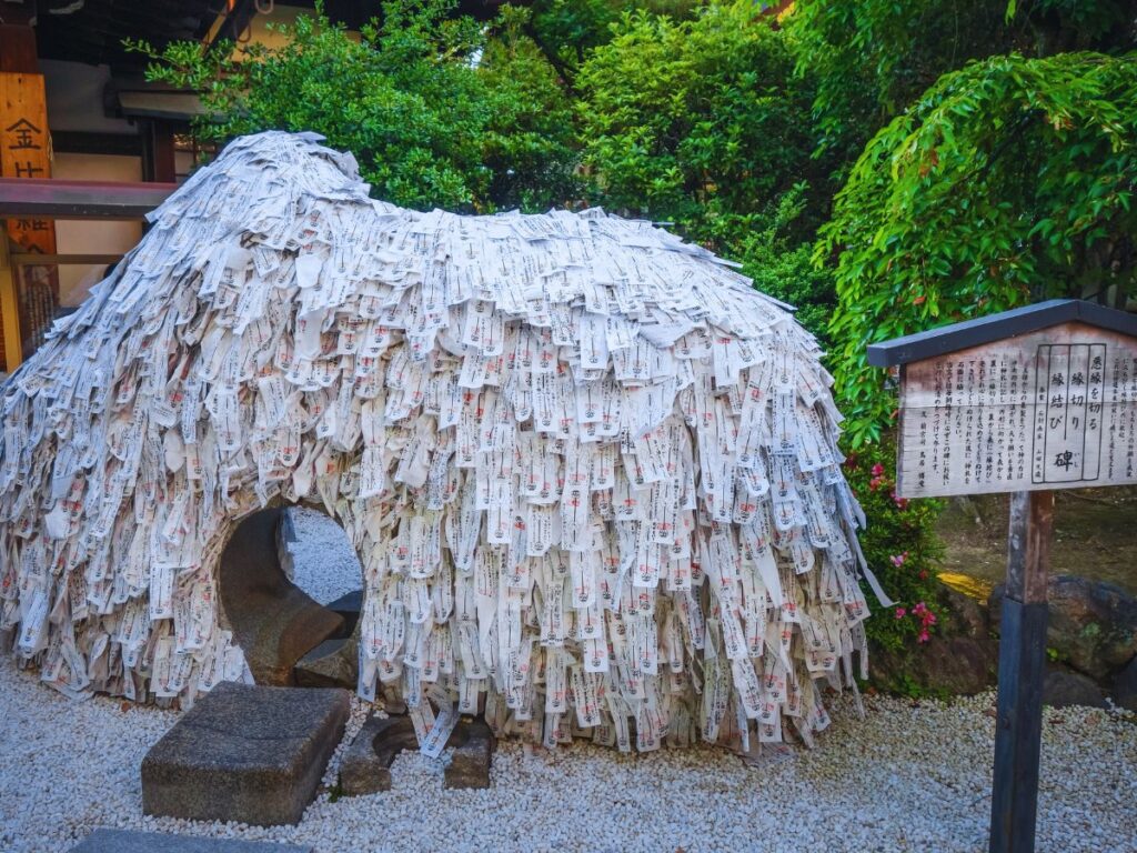 The best free things to do in Kyoto: Crawl Through the Power Stone at Yasui Konpiragu