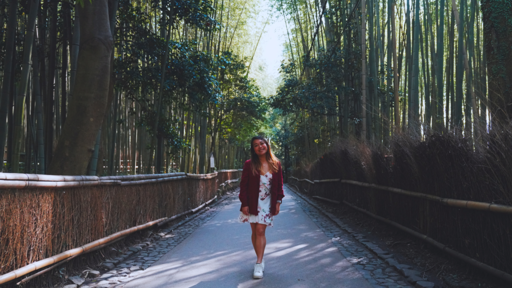 Flip Japan photo of Venese walking through Arashiyama Bamboo Forest