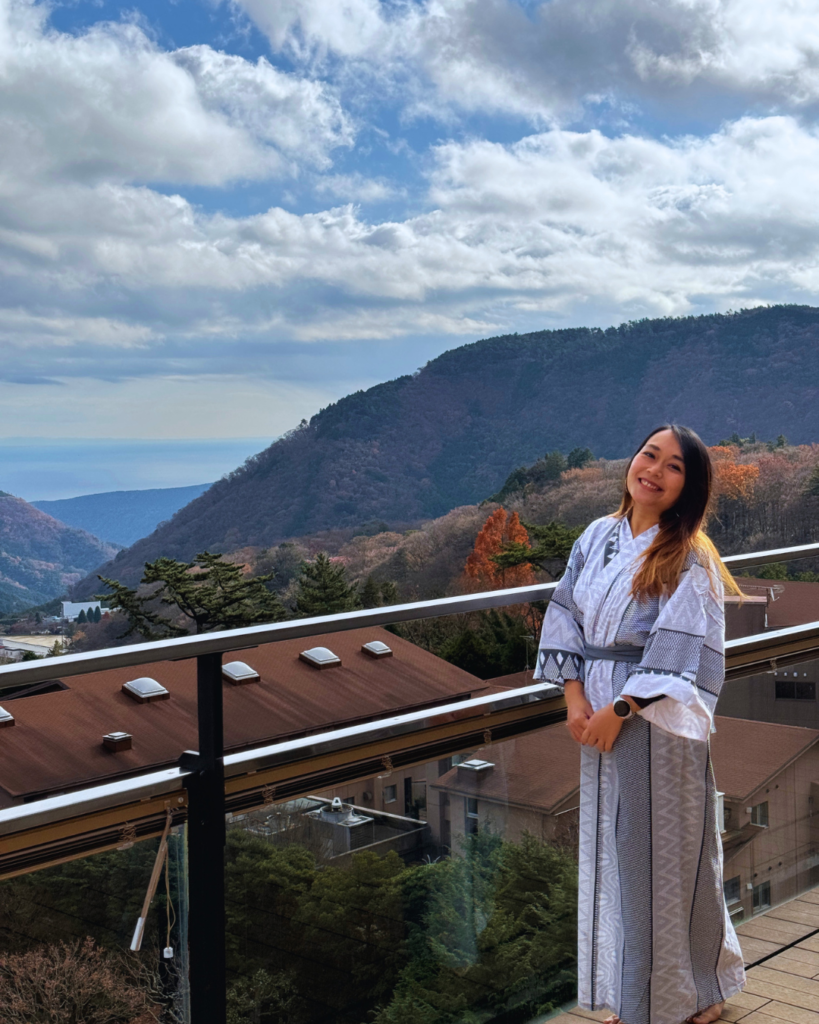 Flip Japan photo of Venese standing on a ryokan balcony in Hakone