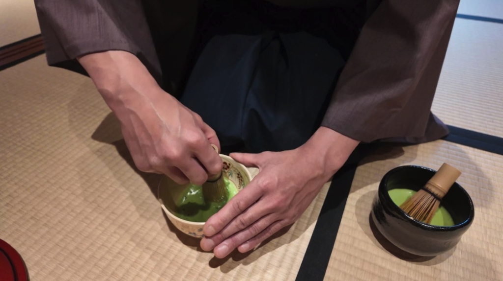 Whisking matcha