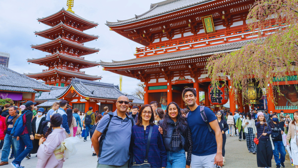 Flip Japan photo of a family standing outside of Senso-Ji temple in Tokyo