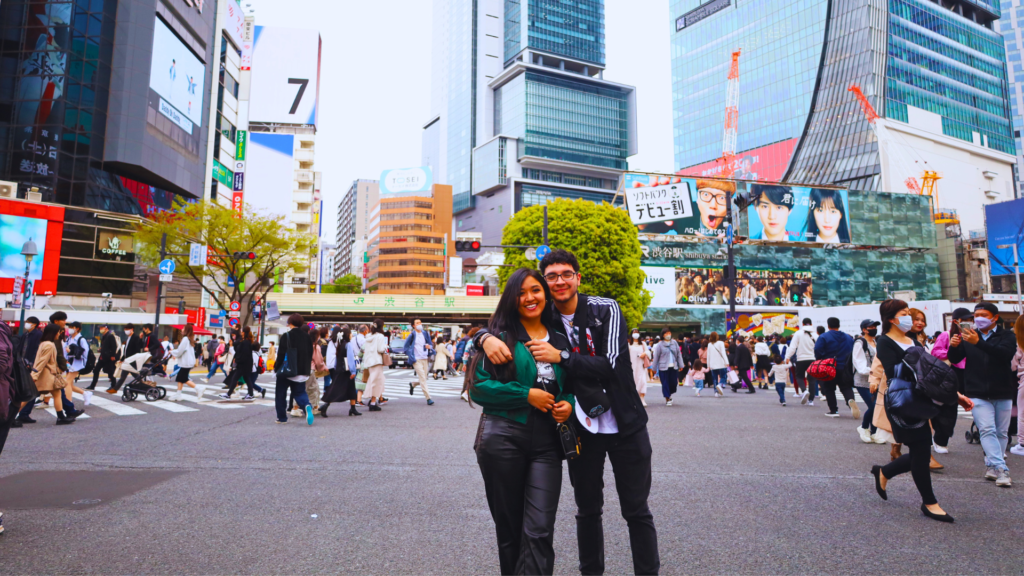Flip Japan photo of a couple hugging and posting in Tokyo