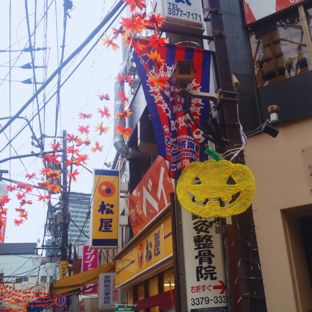 Halloween and Autumn leaves decorate the streets of Shibuya.
