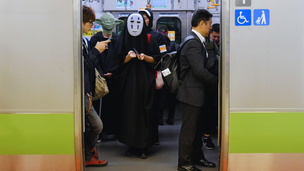 Does Japan Celebrate Halloween? People in Halloween costumes ride the Tokyo Metro subway.